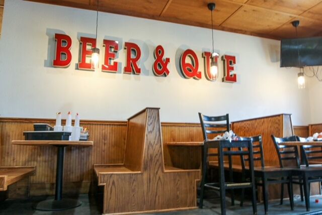 Mike and Ed's Barbecue sign repurposed inside Rob's Ribs to honor the building's past